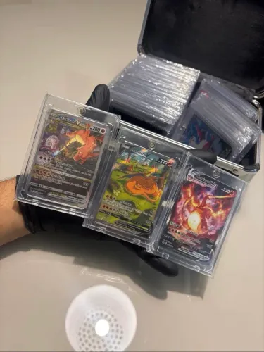 Trio Charizard box americana ? NM