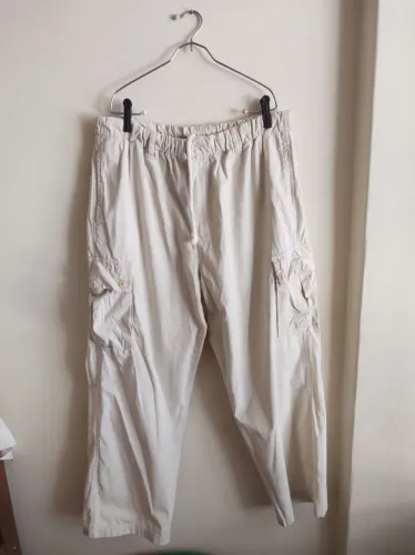 calça bolso creme tamanho GG veste 48