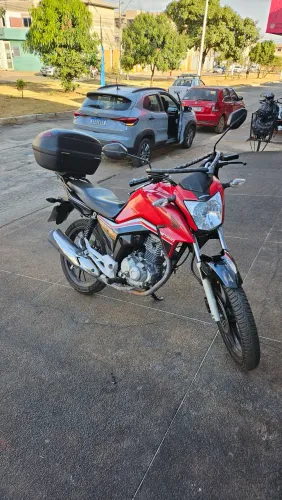 Leia:  protetor/mata cachorro(chapam),tampa lateral/carenagem vermelho cg Titan 2019