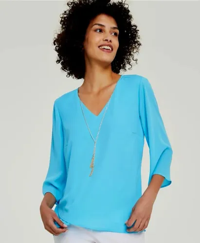 Camisa Blusa feminina azul claro. Tam P