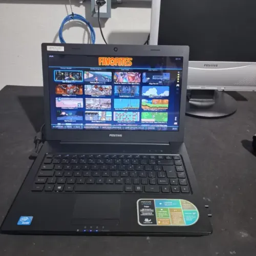Notebook com Sistema de Jogos Retrô