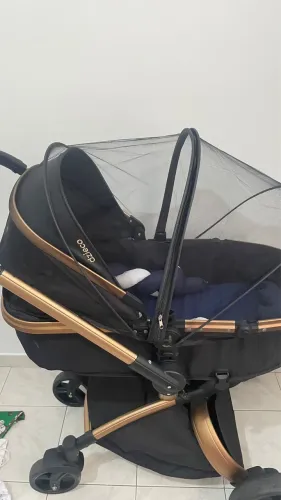 Carrinho com bebê conforto dzieco