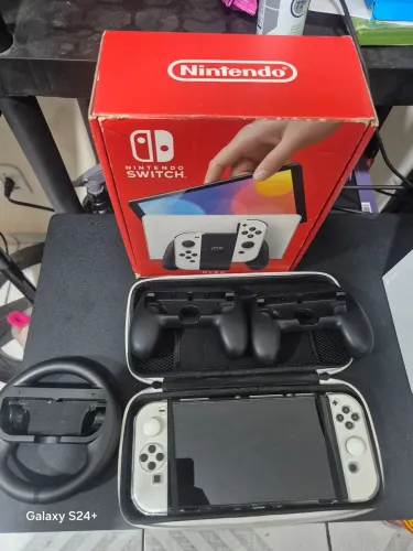 Nintendo switch oled completo aceito vídeo game como parte do pagamento