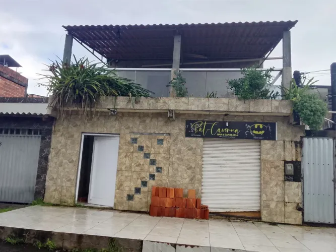 Prédio com ponto comercial
