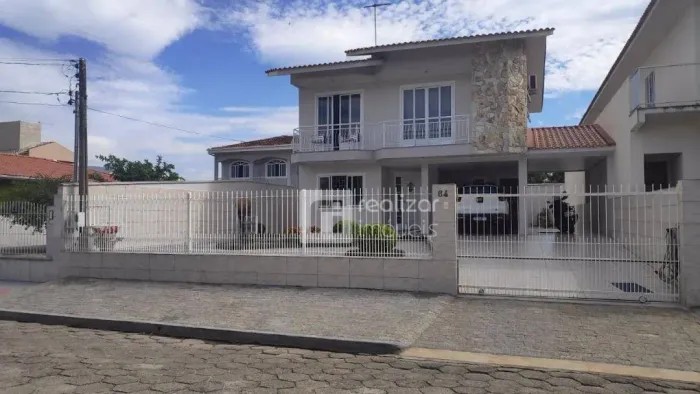 Casa com 3 dormitórios à venda, 240 m² por R$ 1.070.000,00 - Centro - Palhoça/SC