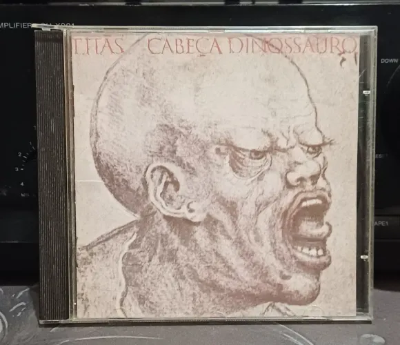 CD TITÃS CABEÇA DINOSSAURO 