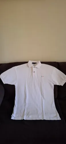 Camisa pólo branca Elle et Lui original 100% algodão.Perfeita pouco uso. Mede 75 cm comp.