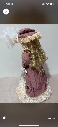 Boneca de porcelana musical 