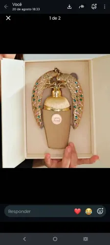 Perfume arabe semi novo ganhei e n gostei abri só pra provar