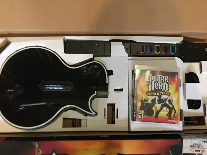 Guitarra les paul + Guitar hero wolrd tour