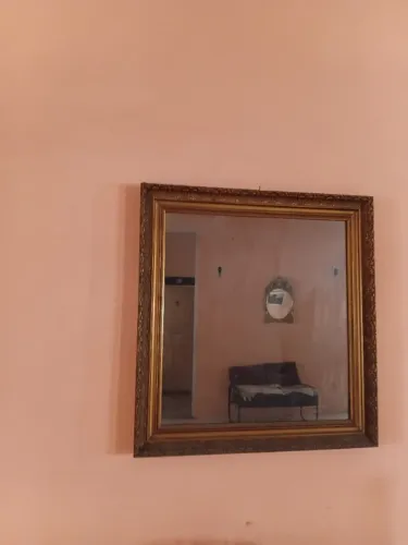 Espelho grande com moldura para sala