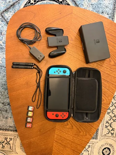 Baixou! Nitendo Switch Oled, 64gb + 4 jogos mídia física