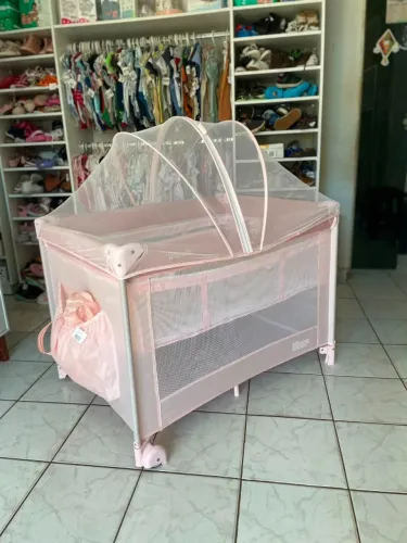berço portátil rosa semi novo