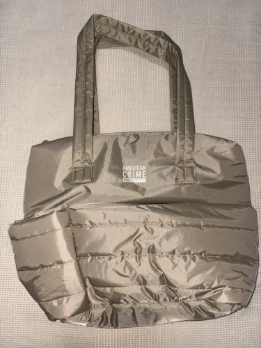 Bolsa puffer American crime- nova tam media