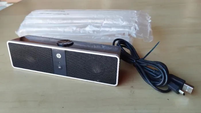 Caixa de som HP com conecção automatica e usb