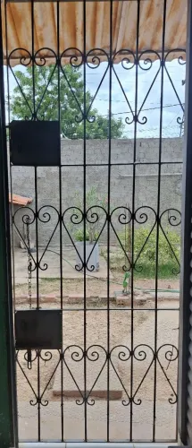 Grade de proteção para porta