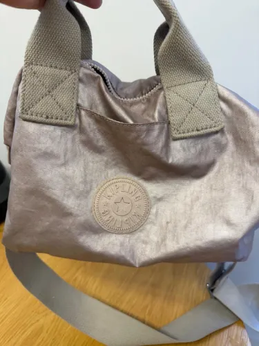 Bolsa dourada Kipling
