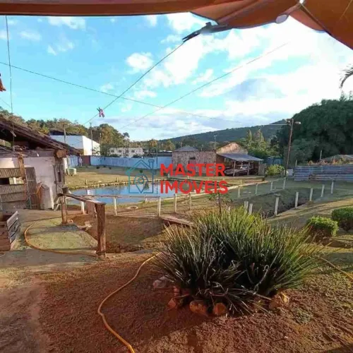 EXCELENTE CASA COM ÁREA GOURMET E LAGO DE PESCA