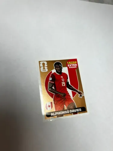 Figurinha Extra Sticker Alphonso Davies Bronze - Copa do Mundo Panini