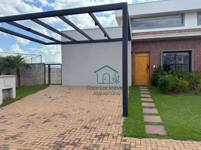Casa com 3 dormitórios à venda, 119 m² por R$ 990.000,00 - Estância das Flores - Jaguariún
