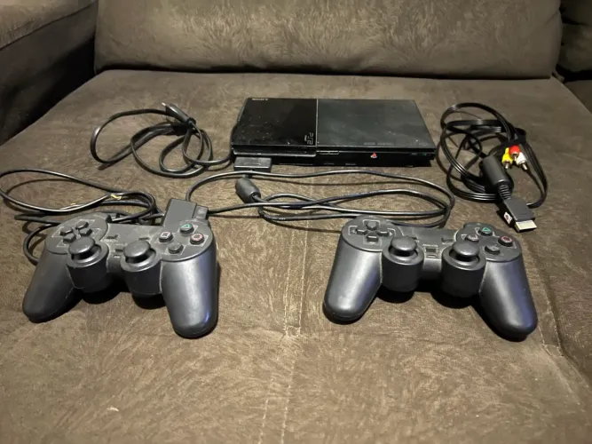 Playstation 2 (leitor funcionando perfeitamente)