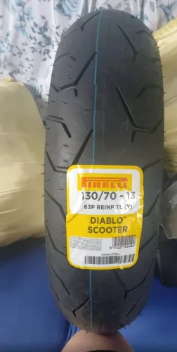 Vendo pneu s/c Pirelli original 130/70 - 13 63p novo 