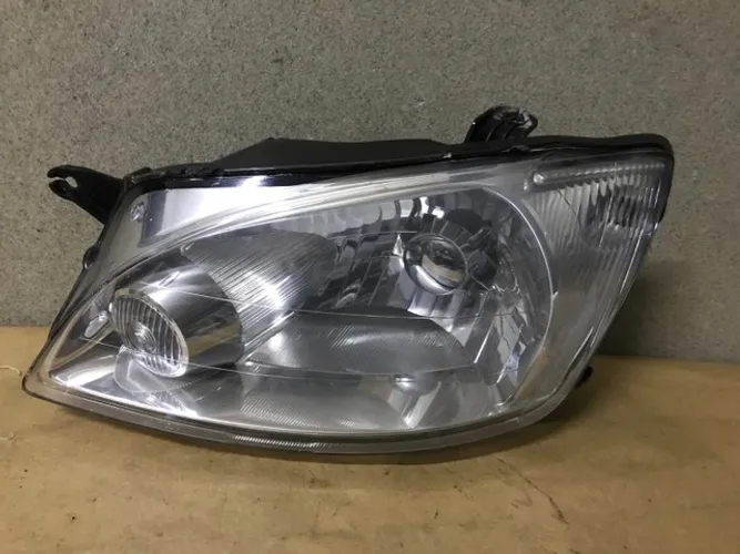 Farol Chevrolet Classic 
