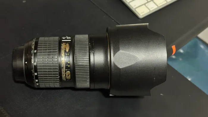 Objetiva Nikon 24-70 F2.8 com defeito
