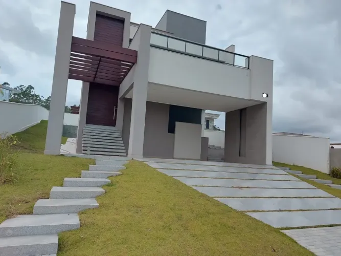 -Residencial Costa Laguna ! Casa 4 suítes - com 420 m² de área construída.