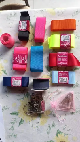 11 Rolos de fita e presilhas