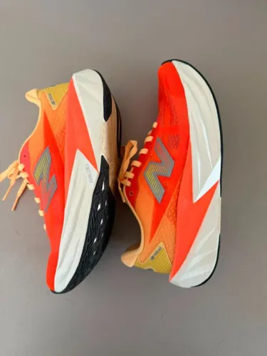 Tênis New Balance Rebel V5 Cor Laranja - tamanho 36