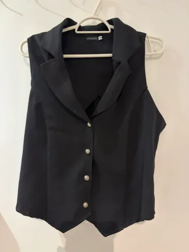 colete preto