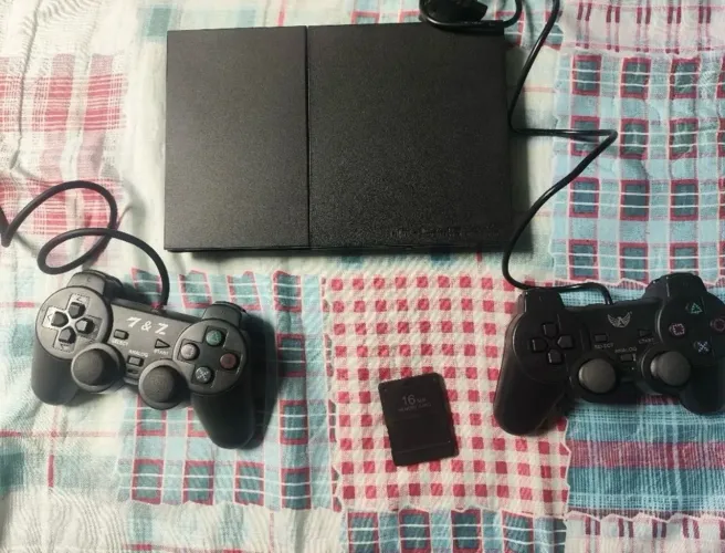 PLAYSTATION 2 (400,00)