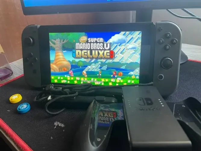 Nintendo Switch V2 + 6 jogos originais + Acessórios