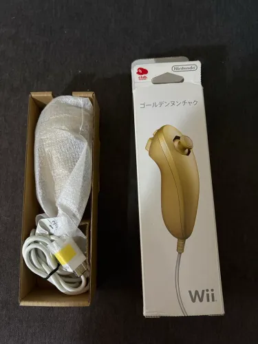 Nunchuk Wii dourado - club Nintendo