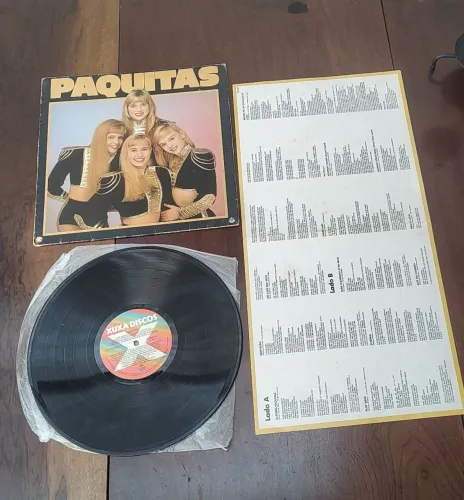 Vinil as paquitas em excelente estado de conservação 