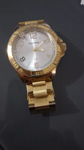 Vendo Relógio UNISEX MONDAINE DOURADO. FUNCIONANDO PERFEITAMENTE.SUPER CONSEVADO ?