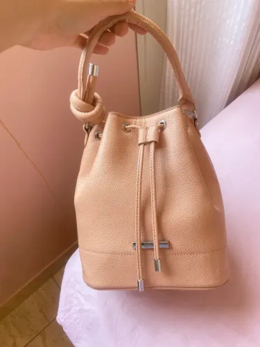 Bolsa Santa Lolla floater na cor nude rosado 