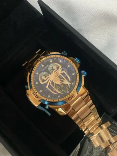 Relógio Reef Tiger Dourado e Azul - Luxo e Estilo!