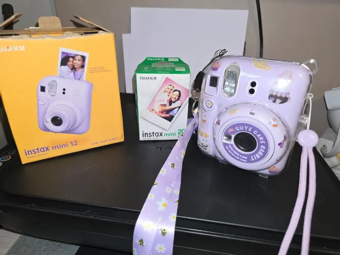 Instax 12 com capa e fotos novo e fechado.
