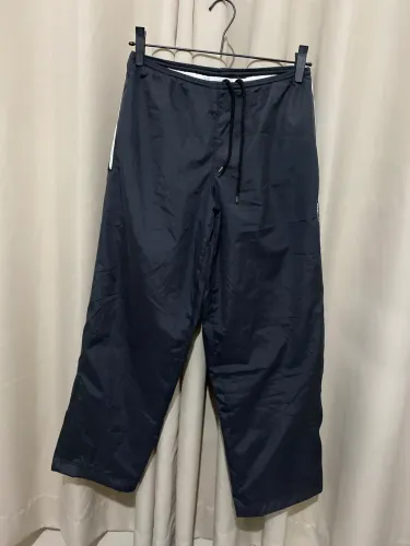 Calça Reebok em tecido tactel tamanho P 