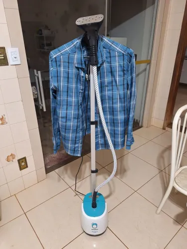 Máquina de passar roupa à vapor