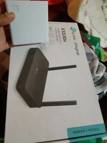 Um roteador completo e novo na caixa