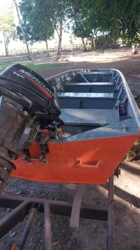 Canoa 5.5 metros usada 1x na água . Zera 