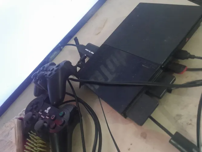 Play 2. Com dois controles 299$ Entrego