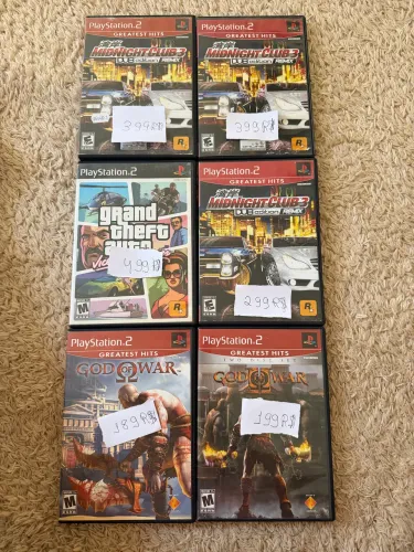 Jogos de ps2 com manual original preço na foto 