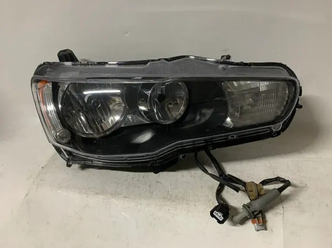 Farol Mitsubishi lancer 11 /13 original lente nova