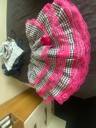 Saia xadrez com detalhes em rosa