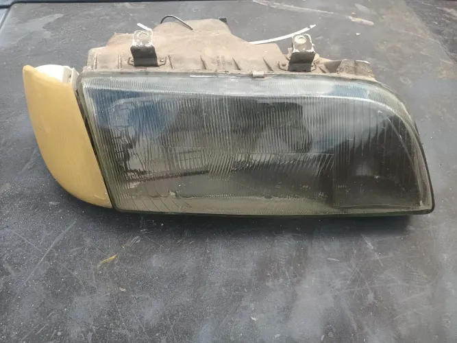 Farol L/D com pisca GM Monza de 91 a 96