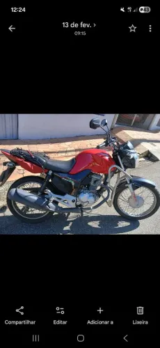 Excelente moto top  tudo ok pneu novo bateria novíssima com Bau 19 mil km .